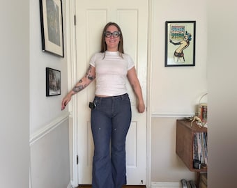 Jeans blu a zampa d'elefante vintage anni '60 Wrangler con patta a scatto