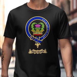 Black t-shirt featuring the Macalpin clan crest with motto and thistle.