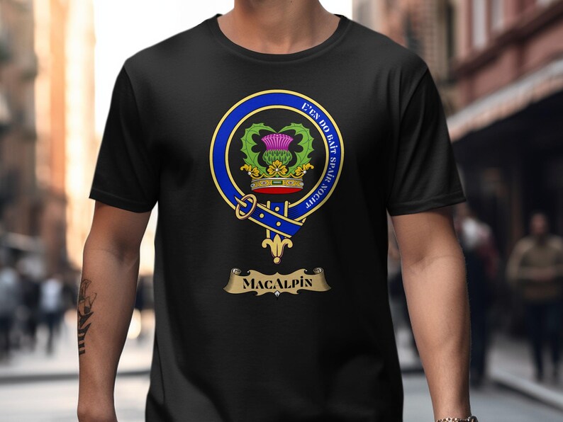 Black t-shirt featuring the Macalpin clan crest with motto and thistle.