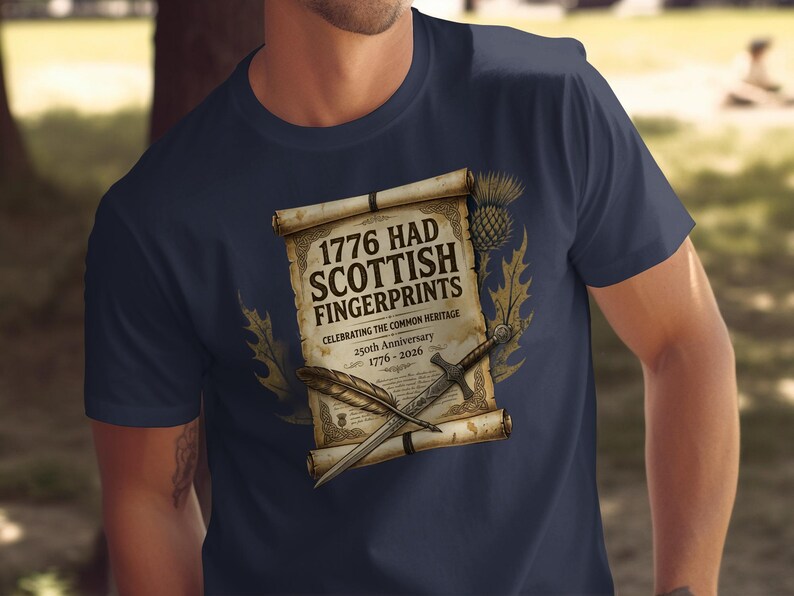 Navy t-shirt with scroll graphic: "1776 HAD SCOTTISH FINGERPRINTS" and thistle design.
