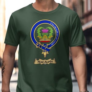 Green t-shirt with MacAlpin clan crest, thistle, and motto.