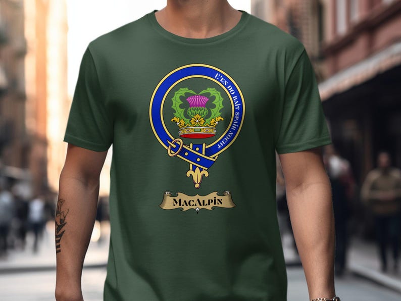 Green t-shirt with MacAlpin clan crest, thistle, and motto.