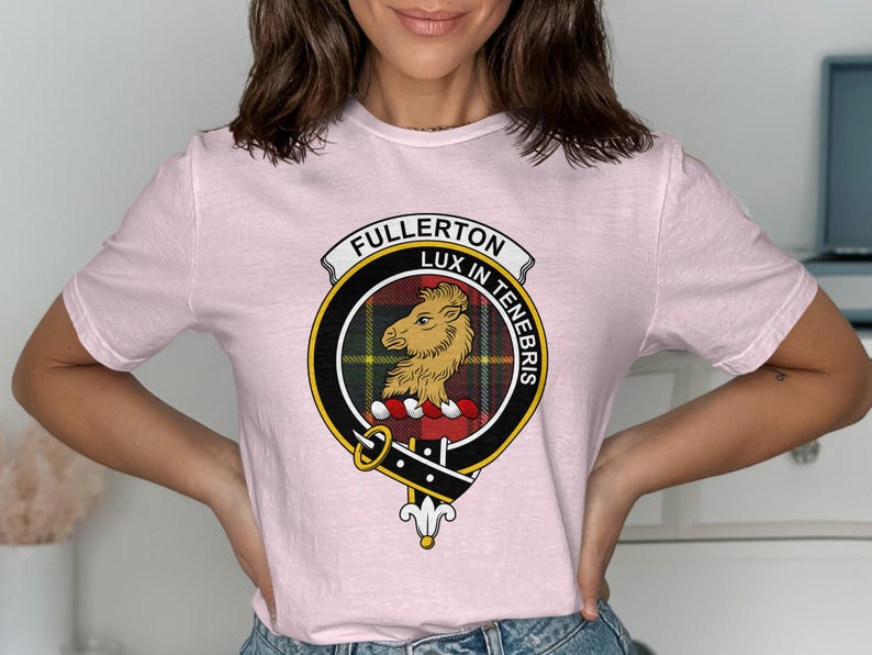 Pink t-shirt with Fullerton Lux in Tenebris clan crest badge.