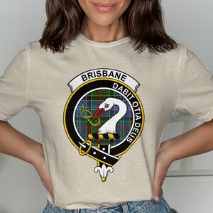 Brisbane Dabit Otia Deus crest with a swan and tartan.