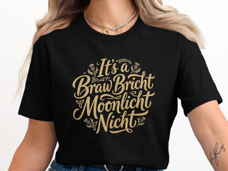 Black t-shirt with "It's a Braw Bricht Moonlight Nicht" text in gold.