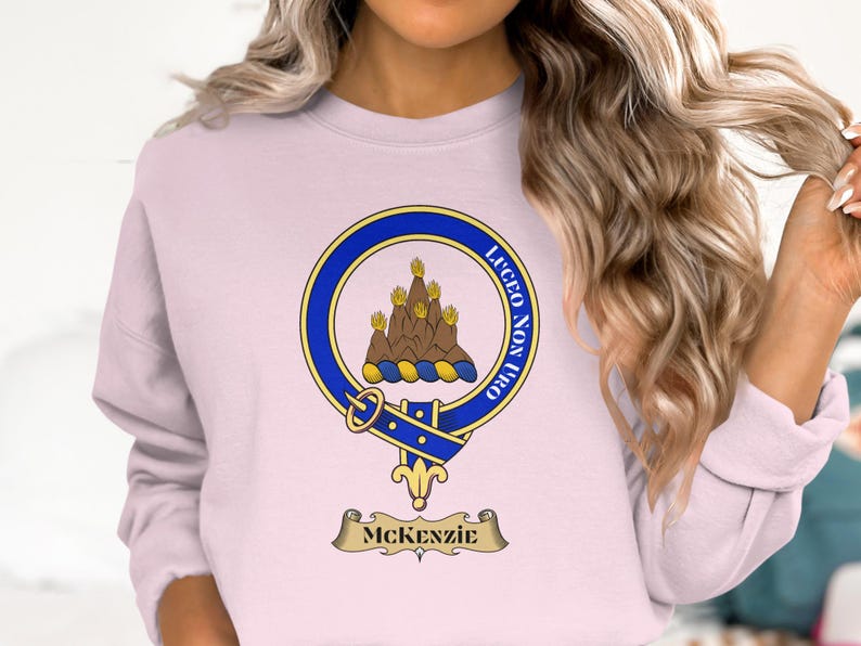 McKenzie clan crest and motto, "Lucem non uro."