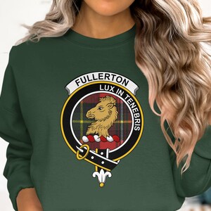 Fullerton tartan crest with a lion and the words "Lux in Tenebris".