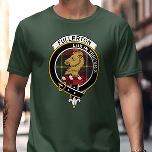 Dark green t-shirt with Fullerton clan crest featuring a lion and "Lux In Tenebris" motto.