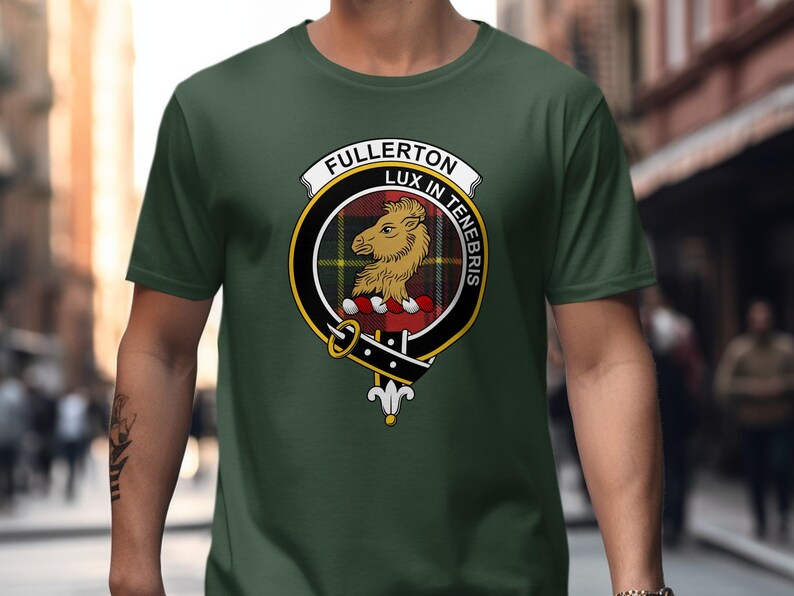 Dark green t-shirt with Fullerton clan crest featuring a lion and "Lux In Tenebris" motto.