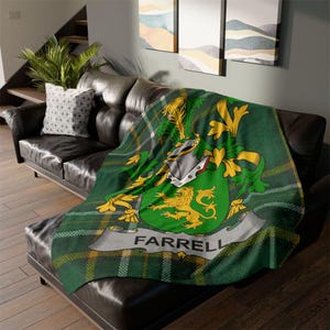 May include: Green, yellow, and white tartan throw blanket with a crest featuring a lion and the name "FARRELL" in a white banner.