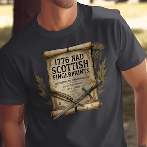 Dark t-shirt with "1776 Had Scottish Fingerprints" design.