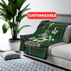 Flanagan surname irish coat of arms blanket, Flanagan family heritage decor, Irish clan crest on tartan background blanket