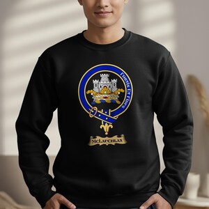 Black sweatshirt with the MacLaughlin clan crest on the chest.