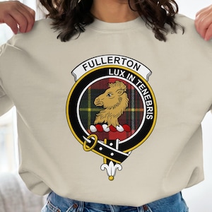 Cream sweatshirt with Fullerton Lux In Tenebris clan crest featuring a lion.