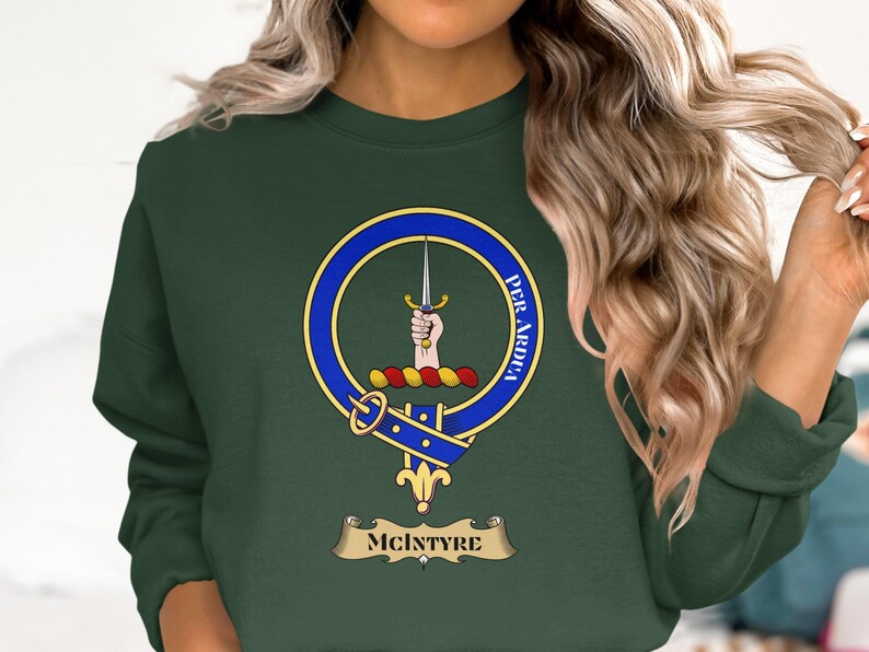 McIntyre clan crest on dark green crewneck sweatshirt.