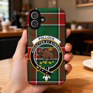 May include: A phone case featuring a green, red, and brown plaid pattern. The case has a crest with the name "POLLOCK" and the motto "AUDACTER ET STRENUE". The crest features a brown boar with a golden arrow.