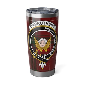 May include: A stainless steel tumbler featuring a Carruthers family crest design. The tumbler has a red and green plaid pattern with the family crest in the center, which includes the words "Carruthers Promptus et Fidelis".