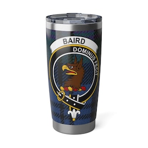 May include: A stainless steel tumbler featuring a blue and green plaid pattern. The tumbler displays a crest with the name "BAIRD" and the Latin phrase "DOMINUS FECIT." The crest includes a brown eagle.