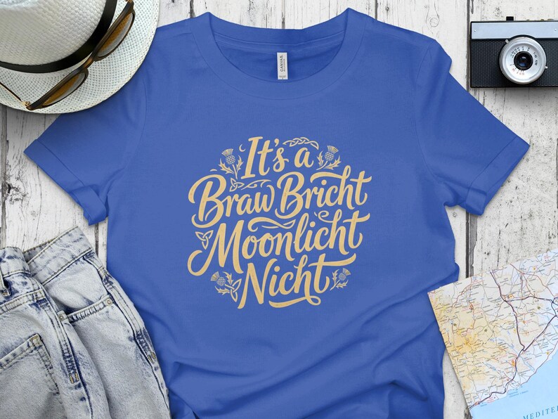 Blue t-shirt with yellow text "It's a Braw Bricht Moonlicht Nicht".