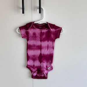 Holiday red shibori organic onesies