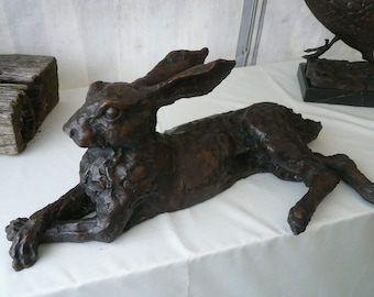 Bronze Hare laying life size , large bronze hare , Resting hare sculpture statue