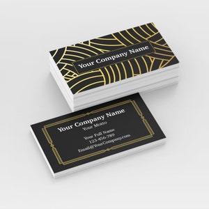 May include: Black and gold business card with a geometric pattern and the text "Your Company Name" and "Your Motto". The card also includes contact information such as a phone number and email address.