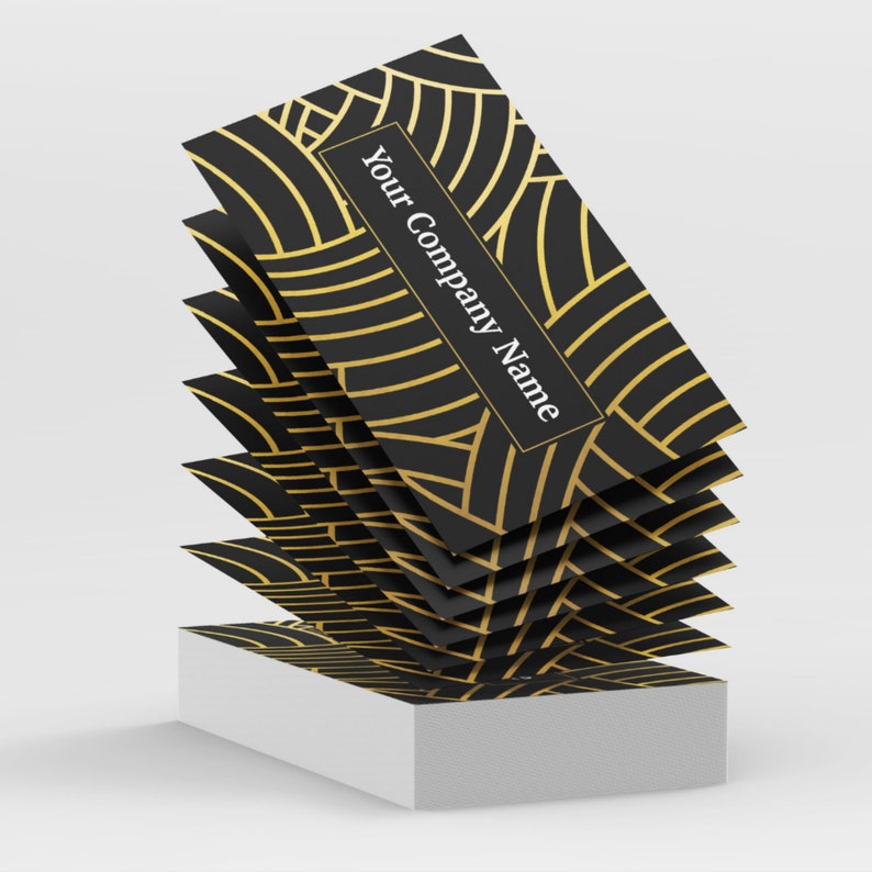 May include: A stack of black and gold business cards with a geometric pattern and the text "Your Company Name" printed on the front.