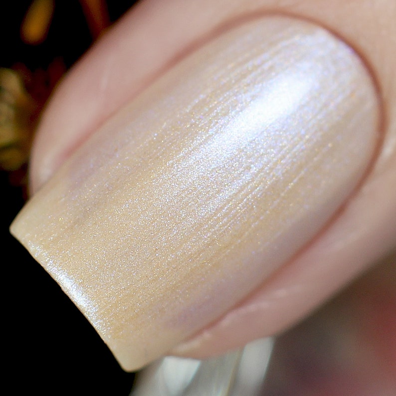 Macro Shot of Moonlight Soft Peachy Beige Nude vegan nail polish by Kolonails on Etsy.