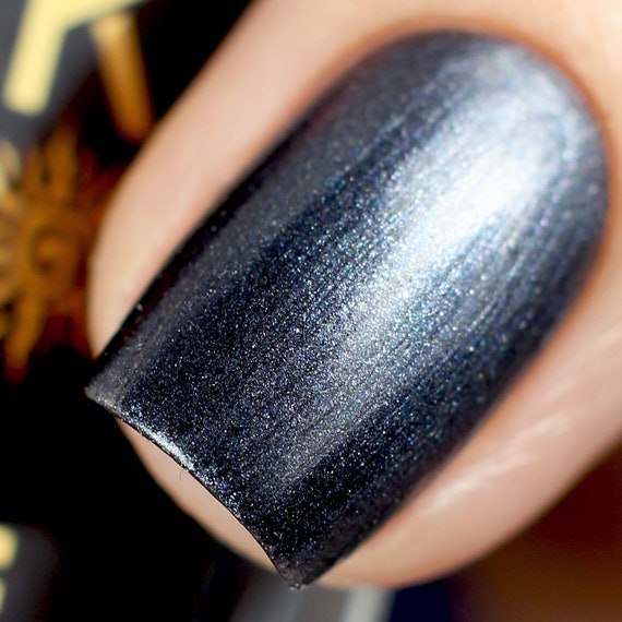 13 Dark, Moody Nail Polish Shades To Wear This Winter