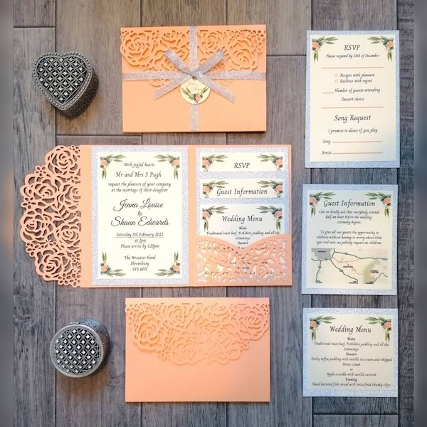 BESPOKE! Peach wedding invitations with silver glitter borders. Laser, die cut, pocket fold, flower. Inside design made entirely for you.