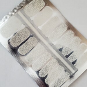 CL015 &quot;Let&#39;s Be Clear - Metallic Silver Flower Mandala&quot; design on clear overlay nail wraps made with 10-FREE, 100% nail polish - nail strips
