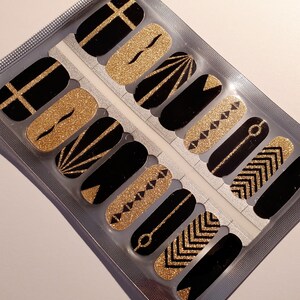 GE025 &quot;Ceasar&#39;s Palace&quot; gold glitter and black lines, chevron, arrows, ovals, flourish, cross, shapes made with 100% Nail Polish wraps