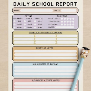 May include: A Daily School Report form printed on cream paper with sections for name, date, eating, toileting, activities, behavior, highlights, and reminders. A light blue pen with a small owl wearing a graduation cap topper rests on the side.