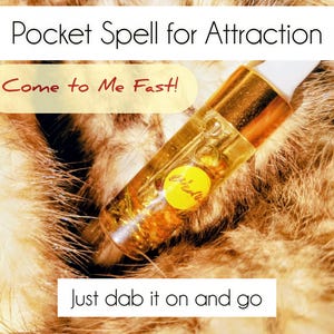 May include: A small clear glass vial with a gold cap containing a golden liquid and botanical elements. A yellow circular sticker with cursive text is on the vial. Text overlays read: Pocket Spell for Attraction, Come to Me Fast!, Just dab it on and go.