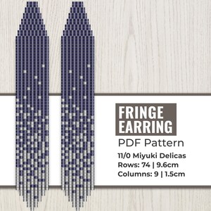 May include: A PDF pattern for fringe earrings featuring a gradient design of dark blue and silver beads. The text reads: FRINGE EARRING PDF Pattern, 11/0 Miyuki Delicas, Rows: 74 | 9.6cm, Columns: 9 | 1.5cm. The design shows two vertical beaded strips.