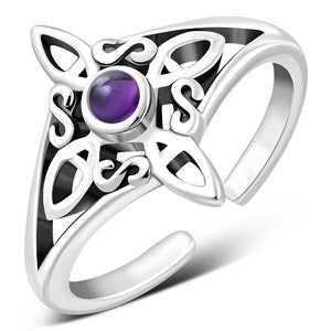 May include: Silver toe ring with an intricate Celtic knot design and a purple gemstone in the center.