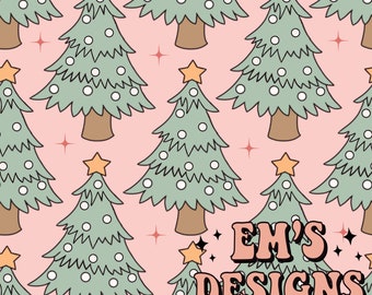 May include: A seamless pattern featuring green Christmas trees with white ornaments and gold stars on a pink background. The text "EM'S DESIGNS" is in the lower right corner in pink letters with a retro font.