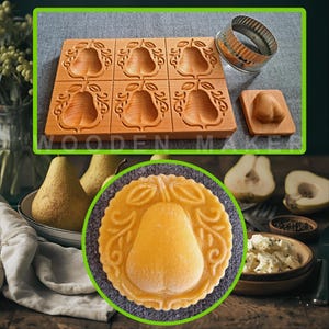 May include: Wooden pear-shaped ravioli mould with six pear impressions, a small wooden stamp, and a round metal cutter. The mould and stamp are made of light-coloured wood. A finished ravioli with a pear design is also shown.