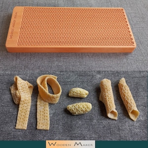 GNOCCHI, TAGLIATELLE, GARGANELLI board. Mod. &quot;Piramidi&quot;. 30x13 cm. Wood and certificate oil.