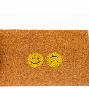 Moderne deurmat met smiley