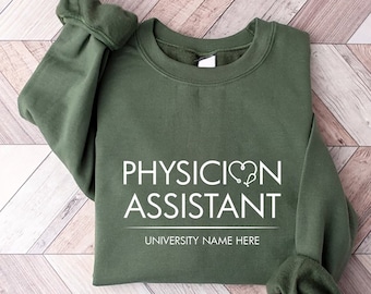 May include: A dark green sweatshirt with the text "PHYSICIAN ASSISTANT" and "UNIVERSITY NAME HERE" in white.