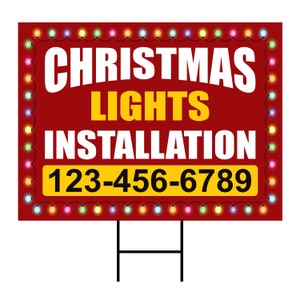 May include: Red and yellow sign with white text that reads "Christmas Lights Installation" and a phone number "123-456-6789". The sign is surrounded by a string of colorful Christmas lights.