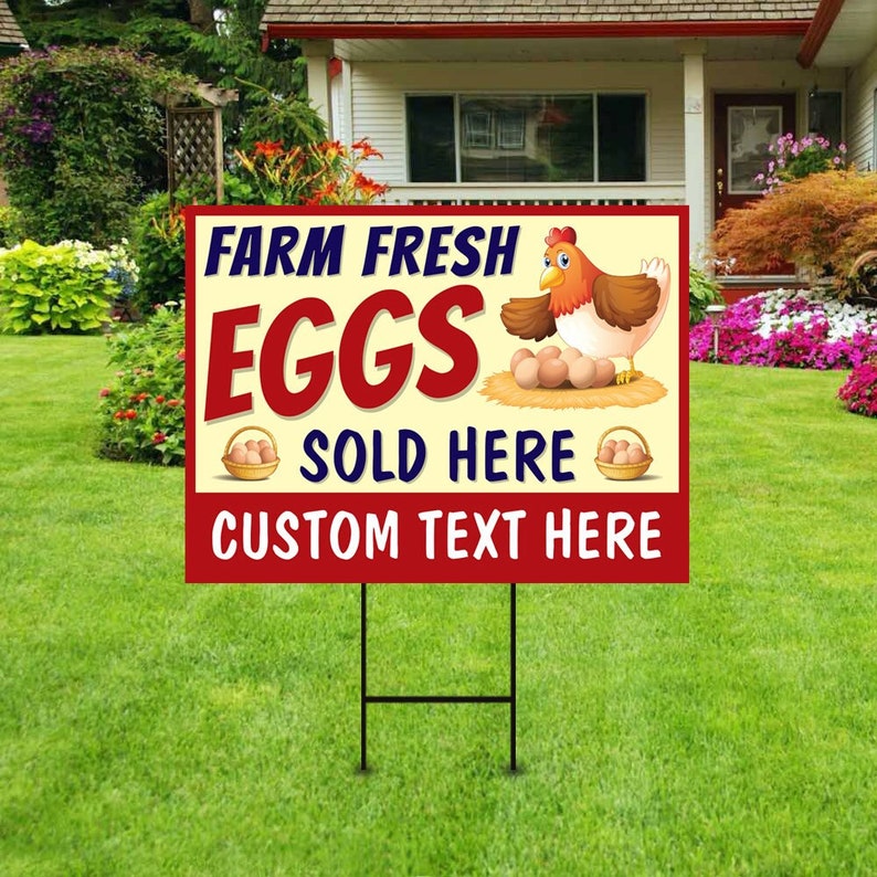 May include: A red and white yard sign with a cartoon chicken and the text "Farm Fresh Eggs Sold Here" and "Custom Text Here".