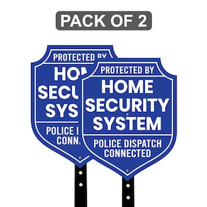 May include: Two blue and white home security system signs with the text "PROTECTED BY HOME SECURITY SYSTEM POLICE DISPATCH CONNECTED". The signs are shield-shaped and mounted on black posts. The text "PACK OF 2" is at the top.