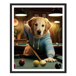 May include: A golden retriever dog wearing a blue hoodie plays pool. The dog is leaning over a green felt pool table with a cue stick in its paws. There are billiard balls on the table, including a striped ball, a solid ball, and a cue ball.