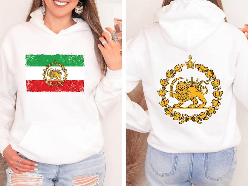 May include: White hoodie featuring the Iranian flag on the front, with green, white, and red stripes and a lion emblem. The back displays a golden lion emblem within a wreath.