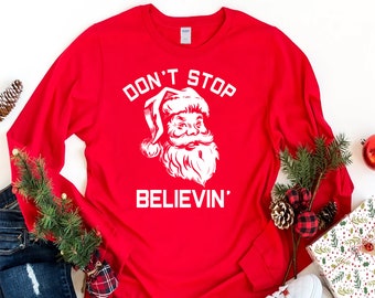 Don't Stop Believing Long Sleeve T-Shirt, Christmas Unisex Long Sleeve Shirt, Believe in Santa Claus Shirt For Kids, Christmas Shirt - 1021