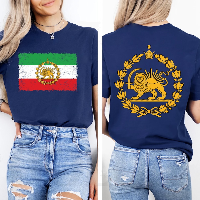 May include: Navy blue t-shirt featuring the Iranian flag on the front and a golden lion emblem on the back. The front design shows a distressed flag with green, white, and red stripes. The back displays a golden lion with a sword.