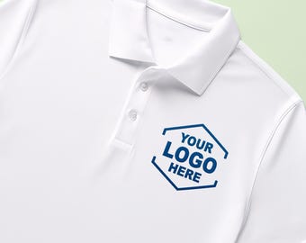 May include: A crisp white short-sleeved polo shirt featuring a classic collar and a three-button placket. On the left chest, there is a dark blue hexagonal graphic containing the text "YOUR LOGO HERE" printed in a bold, sans-serif font.