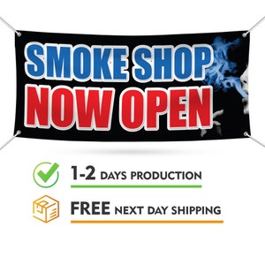 May include: Black banner with white text that reads "Smoke Shop Now Open". The banner has a blue and white image of a person blowing smoke in the background. The banner is hanging from two metal hooks.